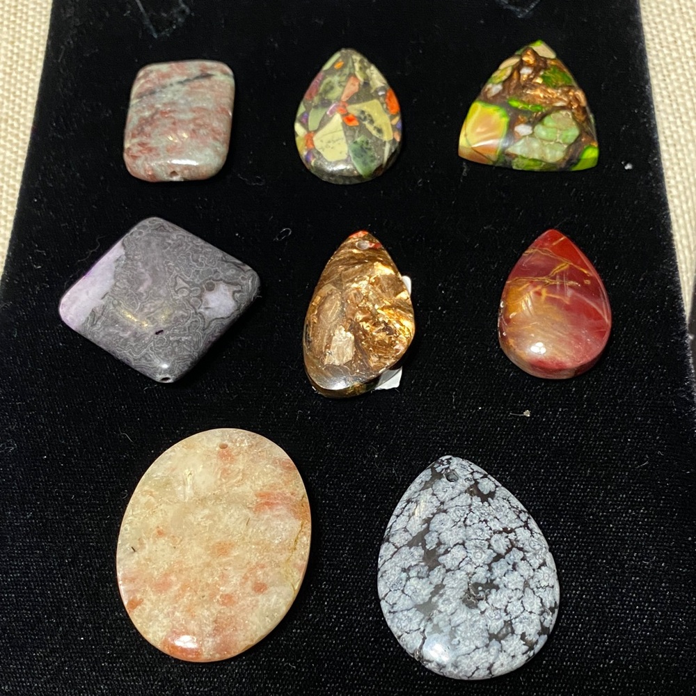 Eight assorted natural gemstones pendants for jewelry makers